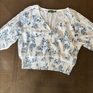 Elegant Blue Floral Blouse with Lace Detail